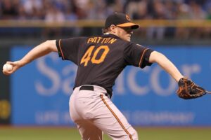 orioles pitcher during tampa bay game arm back before pitch