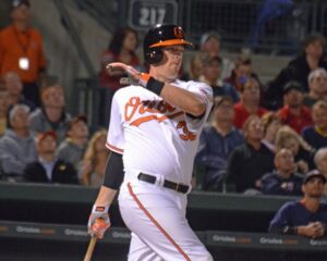 wieter orioles player with arm up after hitting ball