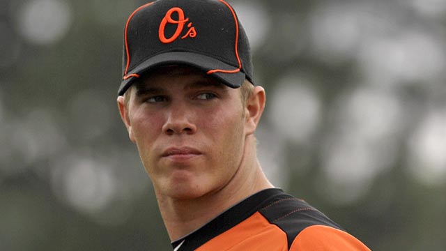 close up of orioles baseball player looking off into distance