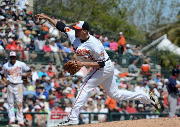 pitcher just throwing pitch on mound