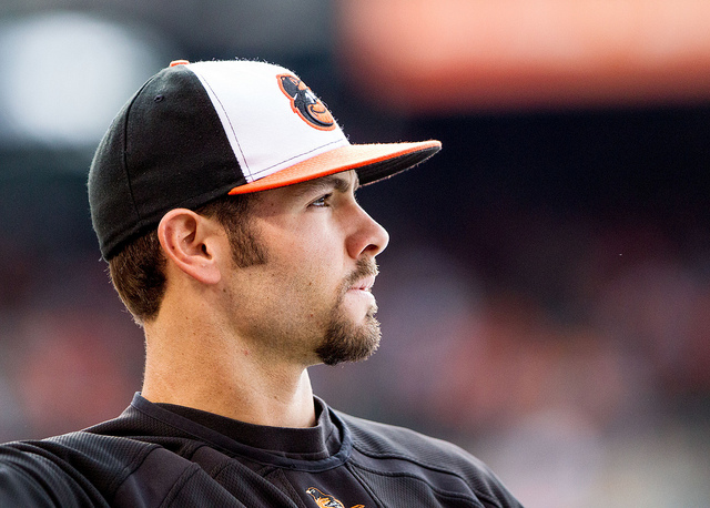 side profile of orioles player looking off into distance