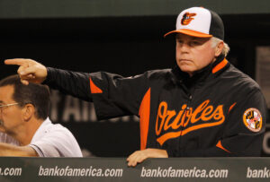 orioles manager buck showalter pointing to the right