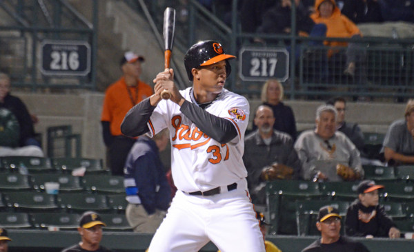 schoop batting for orioles with fans in stand behind him