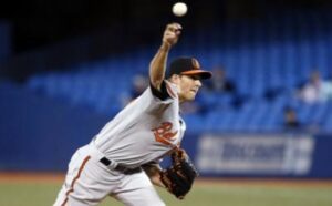 orioles gausman throwing pitch during game