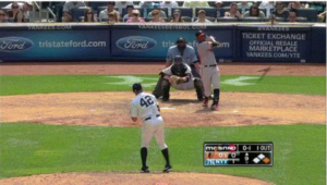 orioles player after hitting baseball with yankees pitcher on mound