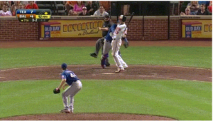 orioles player up at home plate with pitcher on mound