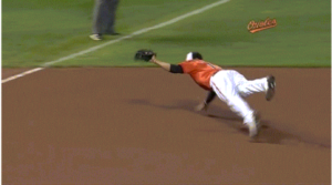 orioles player jumping to catch baseball