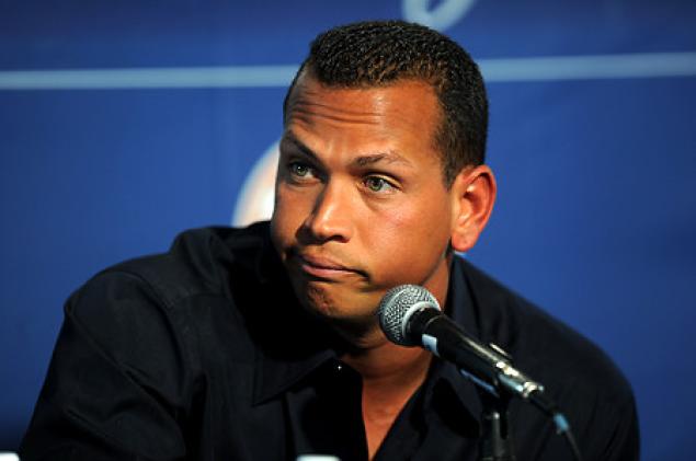 orioles player arod making smirk while sitting in front of microphone