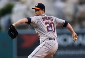 houston pitcher during game before throwing pitch