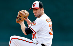 Chris Tillman throws in a Spring Training game in 2013.