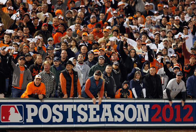 fans in stands with postseason 2012 banner showing