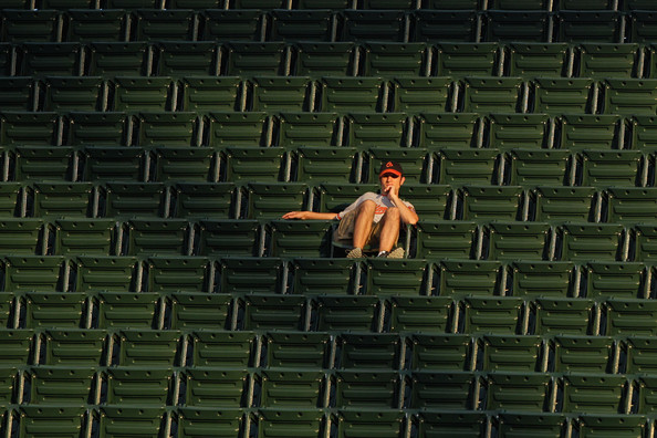 A lonley oriole fan watches from Oriole Park at Camden Yards.