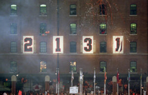 numbers 2131 hanging against brick building wall