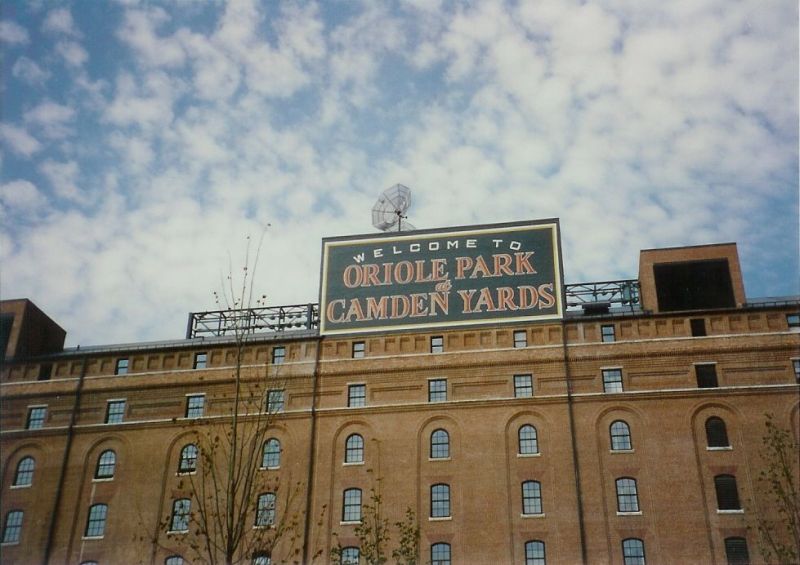 camden yards sign on top of brick building