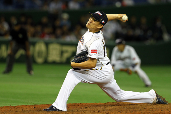 pitcher kneeled back before throwing pitch