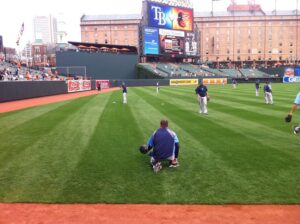 baseball players in field practicing