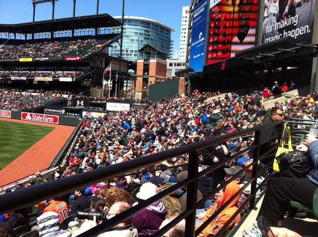 crowded stands filled with fans at baltimore orioles game