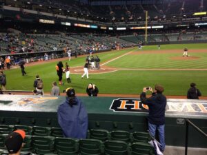 players and referees on field getting ready before game starts