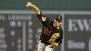 orioles pitcher after throwing pitch during baseball game