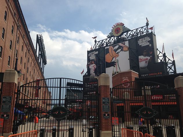 camden yards front entrance from view on other side of rod iron fence
