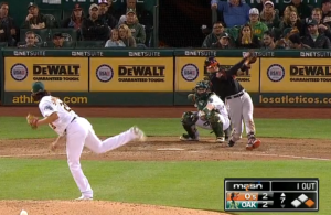 oakland player throwing pitch to orioles batter