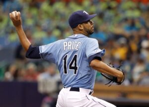 tampa bay pitcher with arm back winding up for pitch