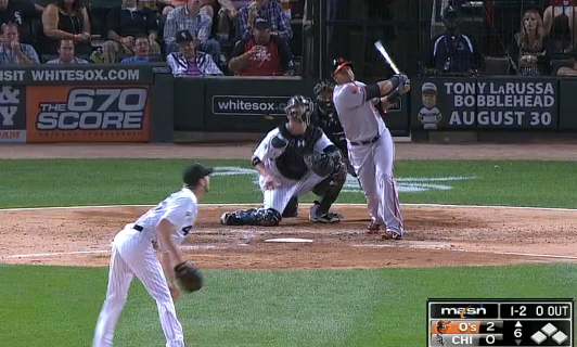 orioles player after hitting ball at home plate