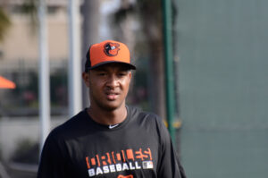 baltimore orioles player schoop wearing orioles shirt and hat