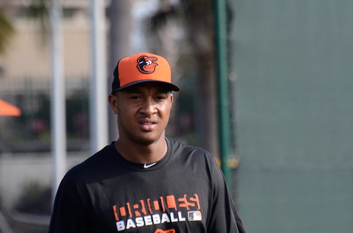baltimore orioles player schoop wearing orioles shirt and hat