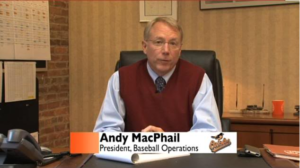 orioles president sitting at desk