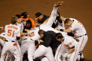 orioles players huddling after game with red sox