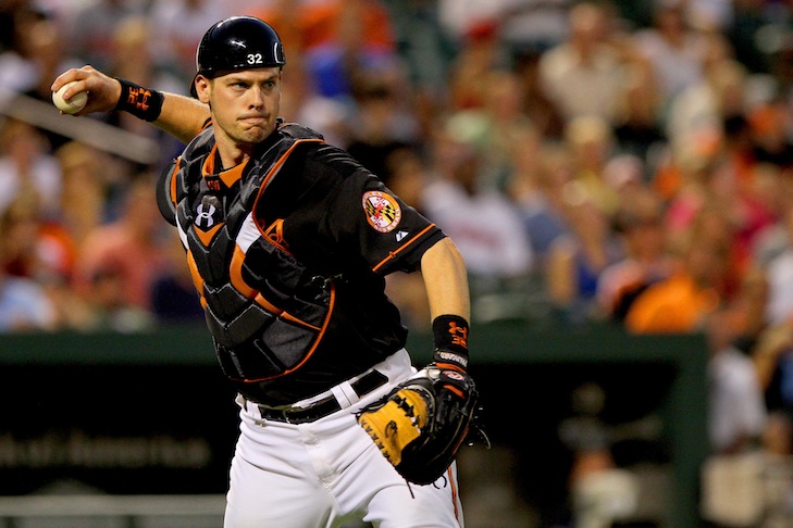 maryland orioles pitcher winded back about to throw ball