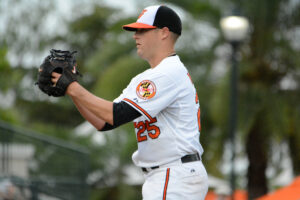 side profile of orioles baseball pitcher
