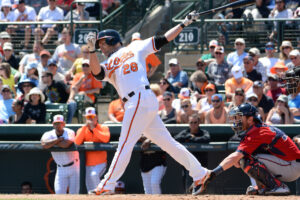 pearce after batting at home plate during orioles game