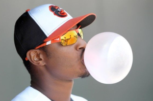 orioles player adam jones blowing bubble with his gum