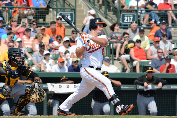 Travis Snider takes a swing in spring training.