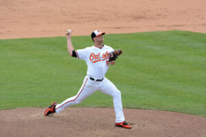 webb with arm back about to throw pitch