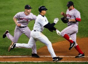 yankees player running getting blocked by red sox players