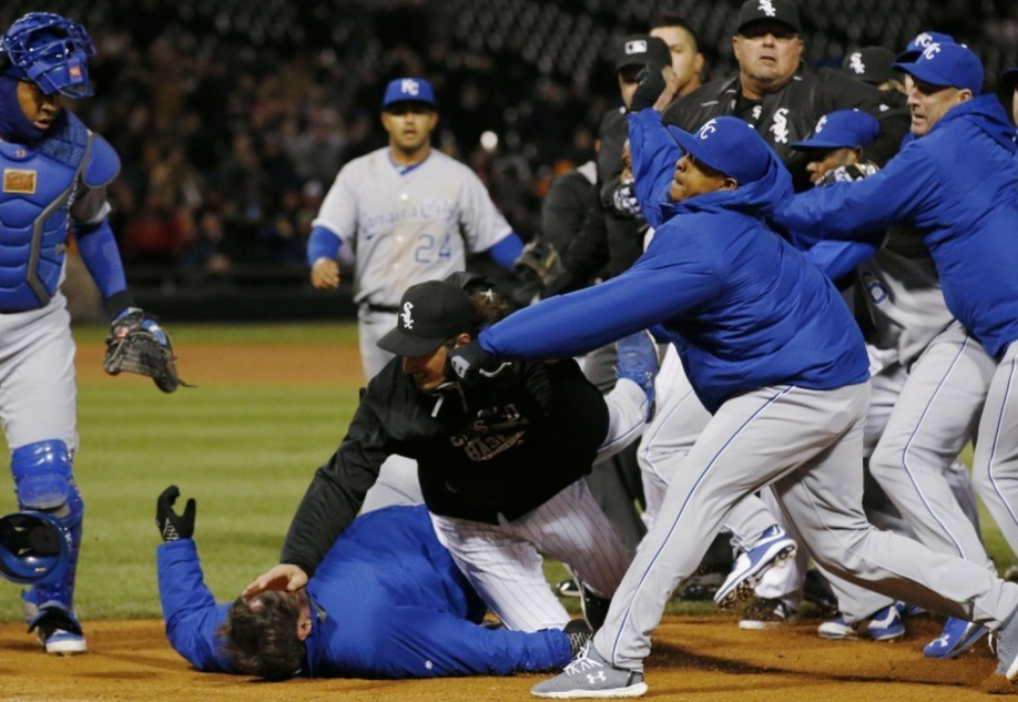 group of baseball players getting into brawl on field