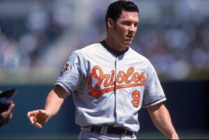 brady anderson in orioles jersey looking into distance