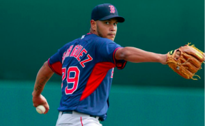 red sox player eduardo rodriguez about to throw a pitch