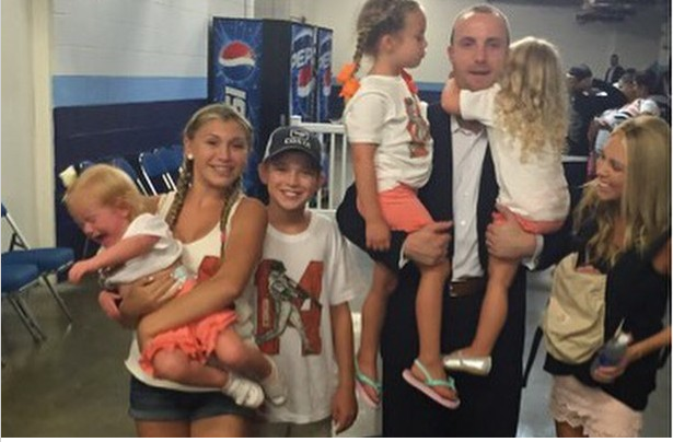 Nolan Reimold with his six children and wife backstage