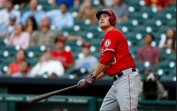 Mark Trumbo watches a home run fly.