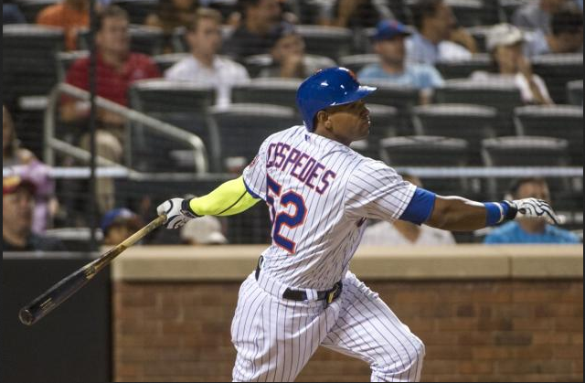Yoenis Cespedes finishes his swing for the New York Mets.