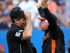 Jun 21, 2013; Toronto, ON, Canada; Baltimore Orioles manager Buck Showalter (26) argues with home plate umpire Angel Hernandez (55) against the Toronto Blue Jays at Rogers Centre.