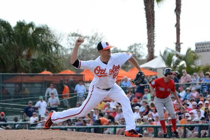 Darren O'Day delivers a pitch in spring training.