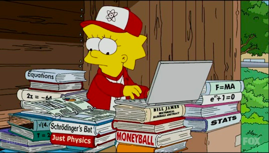 Lisa Simpson reads baseball books.