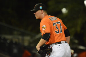 Dylan Bundy looks in for a sign.