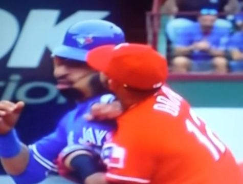 Rougned Odor punches Jose Bautista in the face.