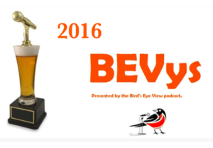 BEV logo and a golden microphone on a beer trophy.